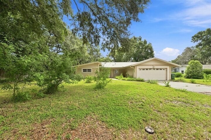 Property Photo:  11515 N Ravine Road  FL 33612 
