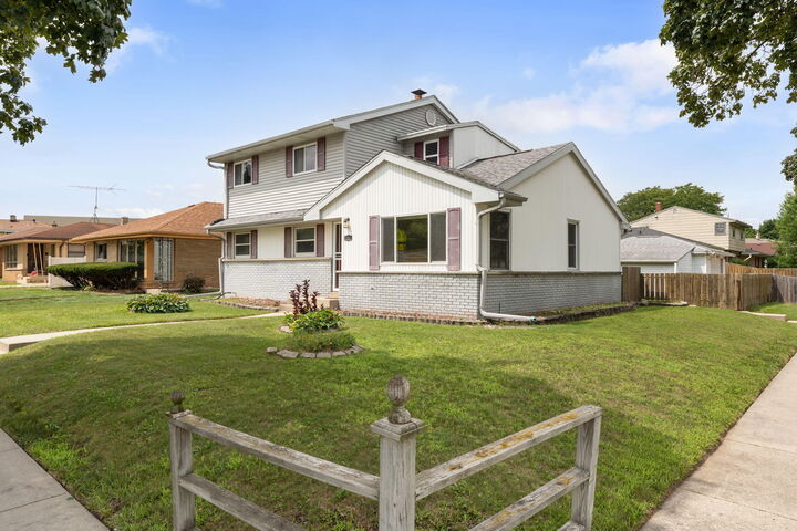 Property Photo:  8302 W Courtland Ave  WI 53218 