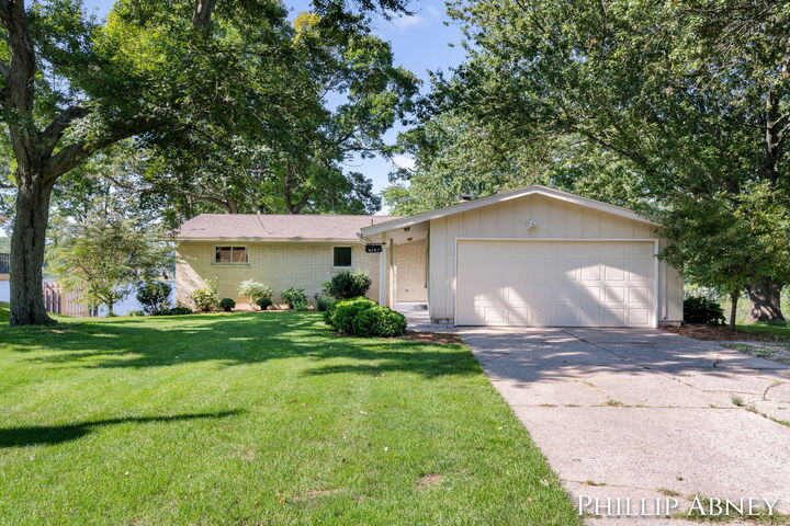 Property Photo: 8391 Cowan Lake Drive NE MI 49341