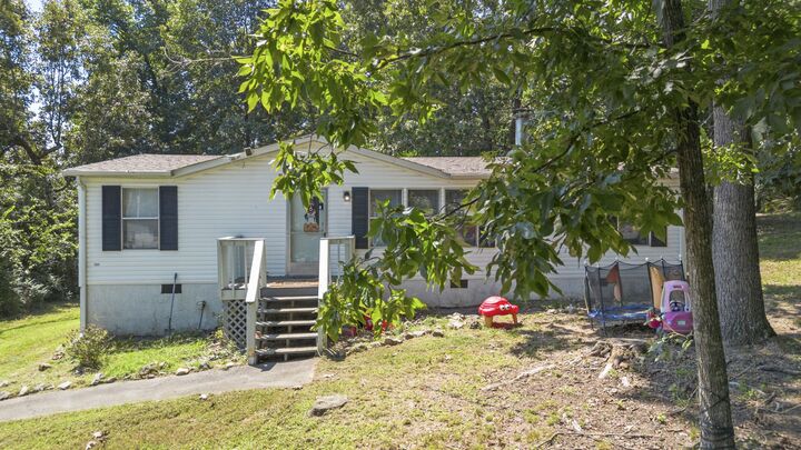Property Photo:  210 W Meadows Ln NE  TN 37312 