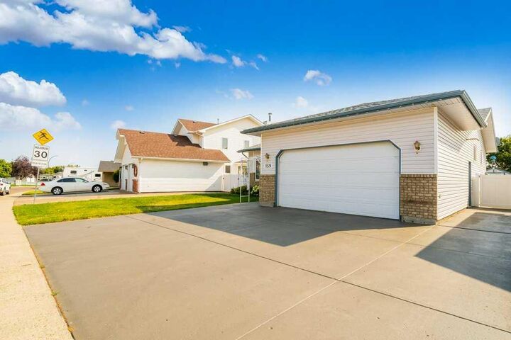 Property Photo: 159 Shannon Drive SE AB T1B 4C2