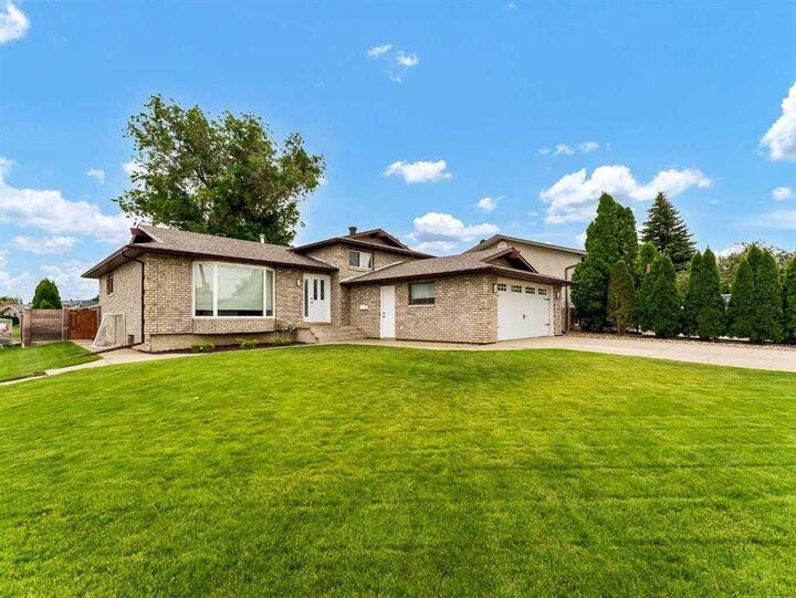 Property Photo:  238 Cameron Road SE  AB T1B 1P3 