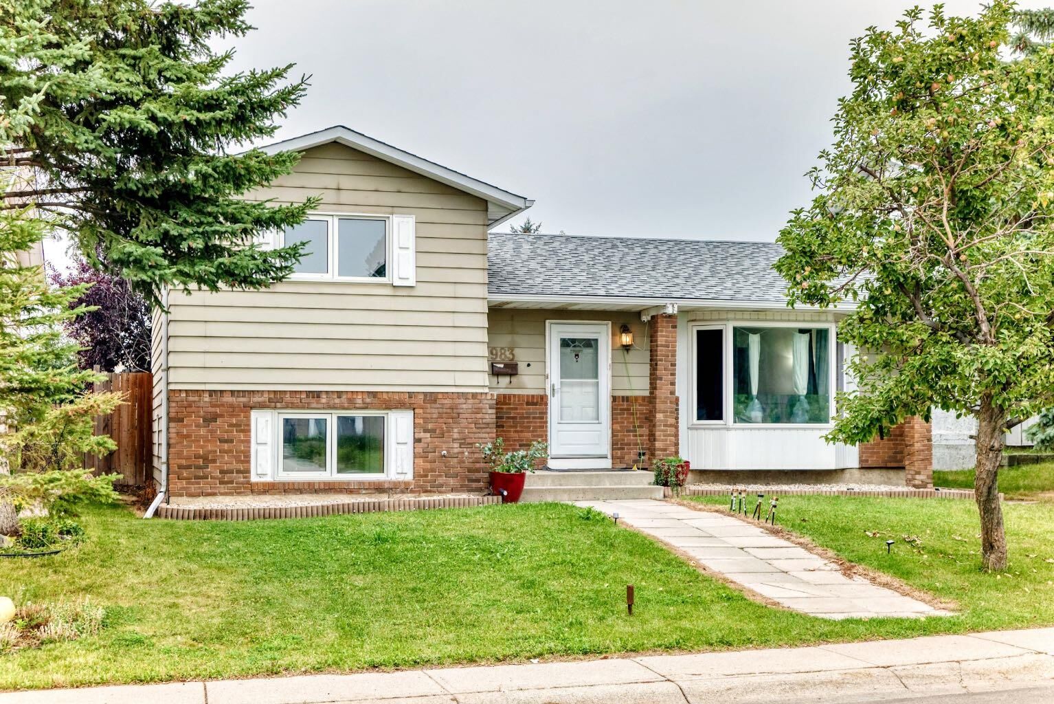 Property Photo: 983 Rundlecairn Way NE AB T1Y 2W7