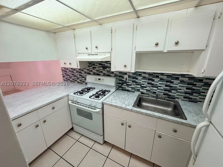 Property Photo: 1300 W 47th Pl 216A FL 33012