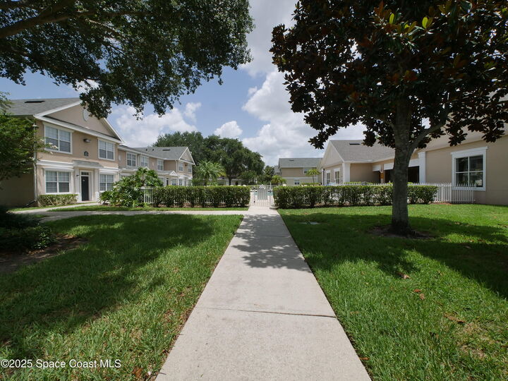 Property Photo:  100 Colibri Way  FL 32901 