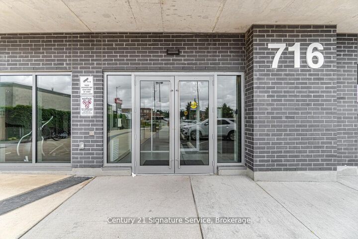 Property Photo:  716 Main Street E 911  ON L9T 3P6 