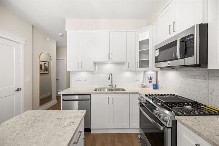 Property Photo: 11063 Ravine Road 307 BC V3T 3X5