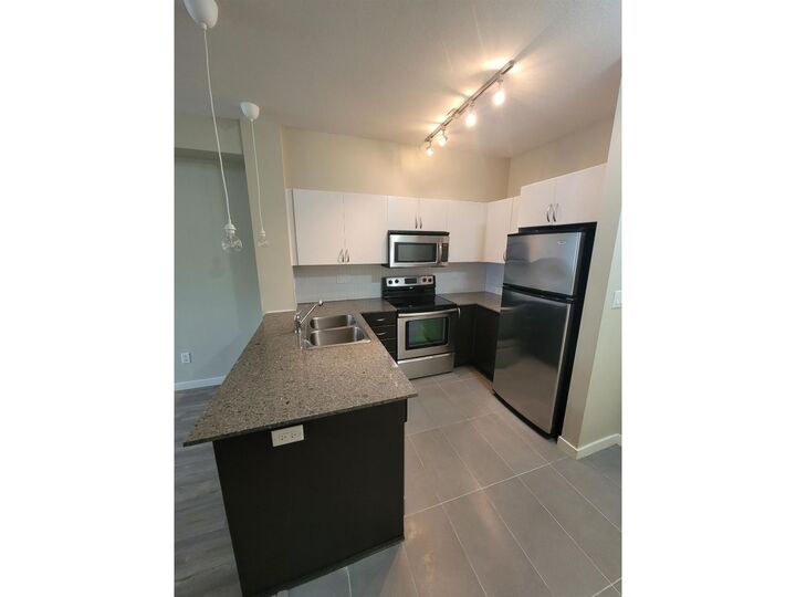 13789 107A Street 229 — photo 1