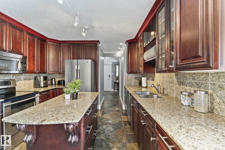 Property Photo:  10745 83 Avenue NW 405  AB T6E 2E5 