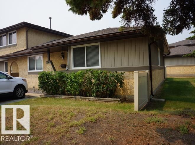 Property Photo:  8930 99 Avenue 38  AB T8L 3L1 