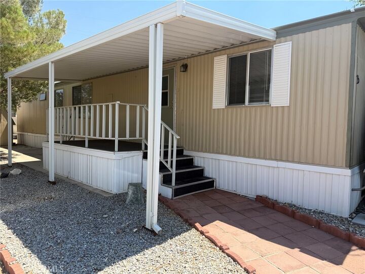Property Photo:  22601 Bear Valley Road 35  CA 92340 