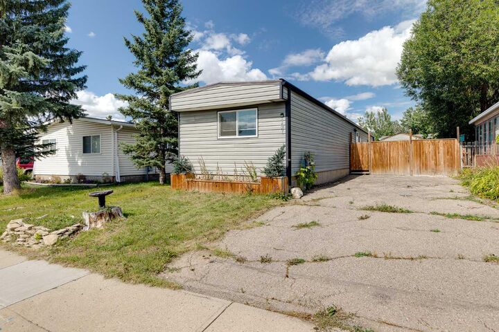 Property Photo: 197 Spring Dale Circle SE AB T4A 1N9
