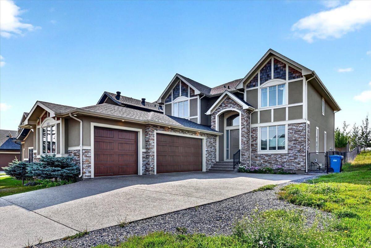 Property Photo: 115 Coulee Way SW AB T3H 0S4