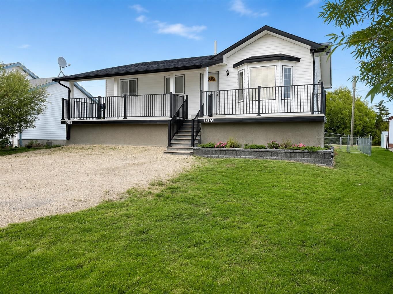 Property Photo:  121A & 121B, 71322 Range Road 262 121A &Amp 121B  AB T0H 0Y0 