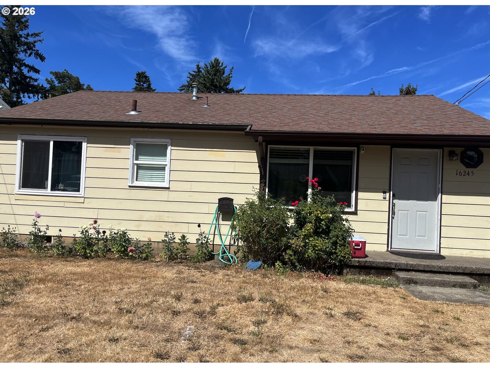 Property Photo:  16245 SE Market St  OR 97233 
