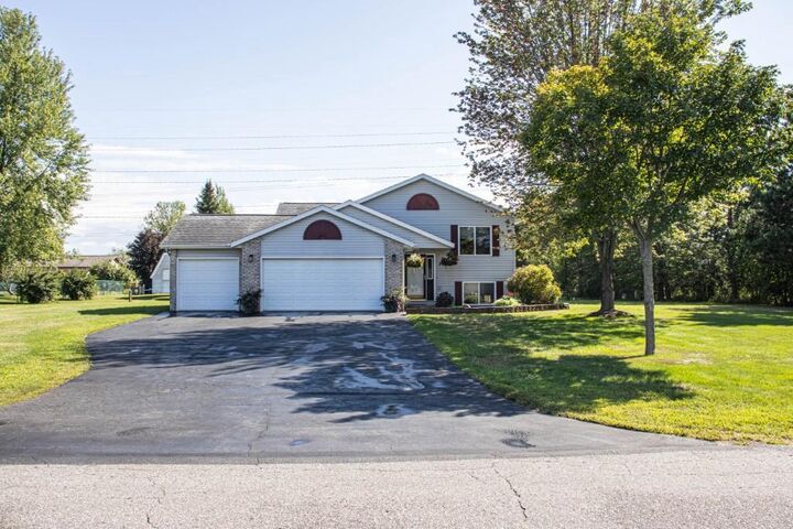 Property Photo:  307 E Industrial Park Avenue  WI 54474 