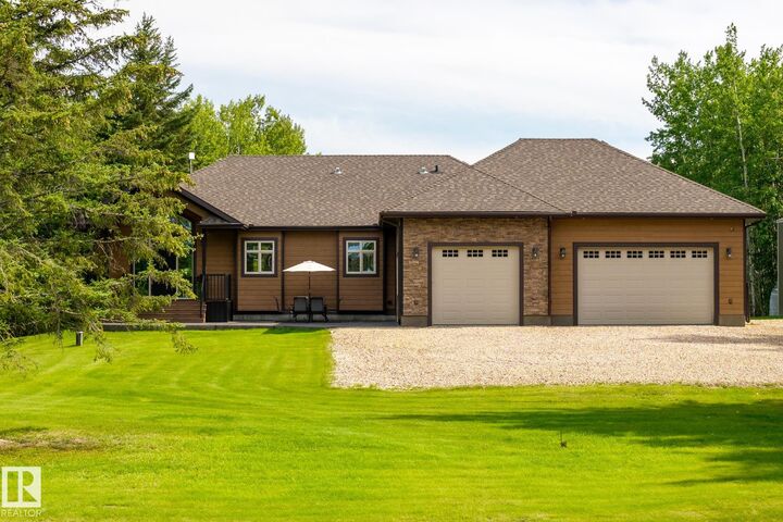 Property Photo: 211 Aspen Drive AB T9S 1S3