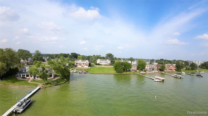 Property Photo:  1540 Cass Lake Road  MI 48320 1007 