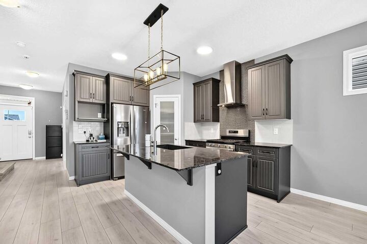 Property Photo: 682 Redstone Drive NE AB T3N 1K9