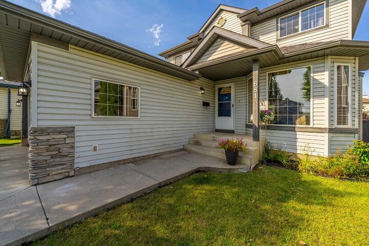 Property Photo: 681 Harvest Hills Drive NE AB T3K 4R3