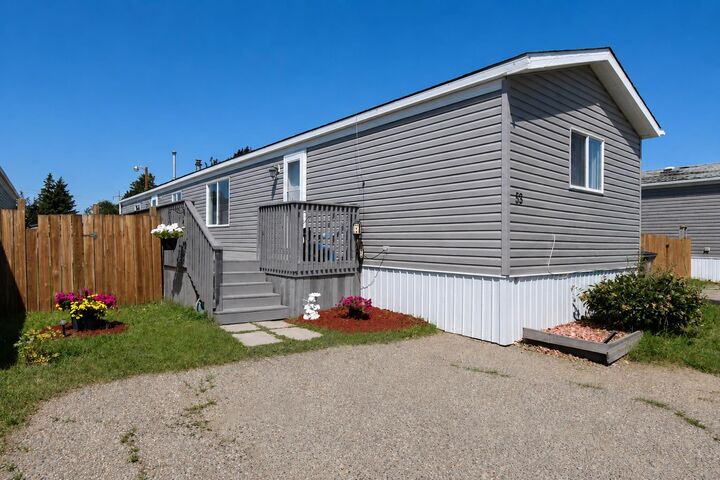 Property Photo: 53 Maple Drive W AB T1R 1J2