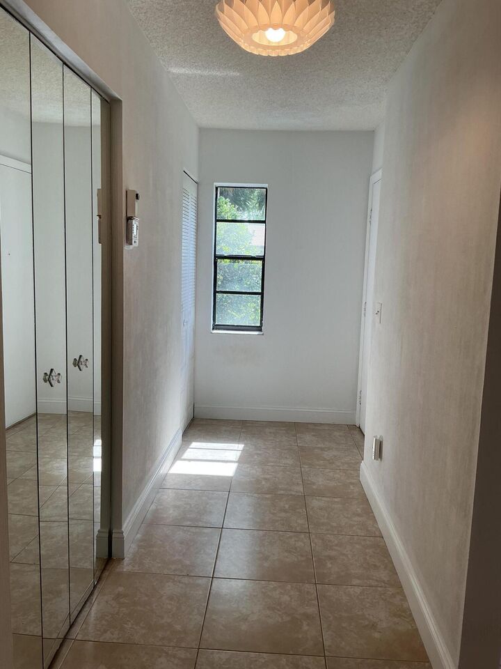 Property Photo:  9264 Vista Del Lago H  FL 33428 