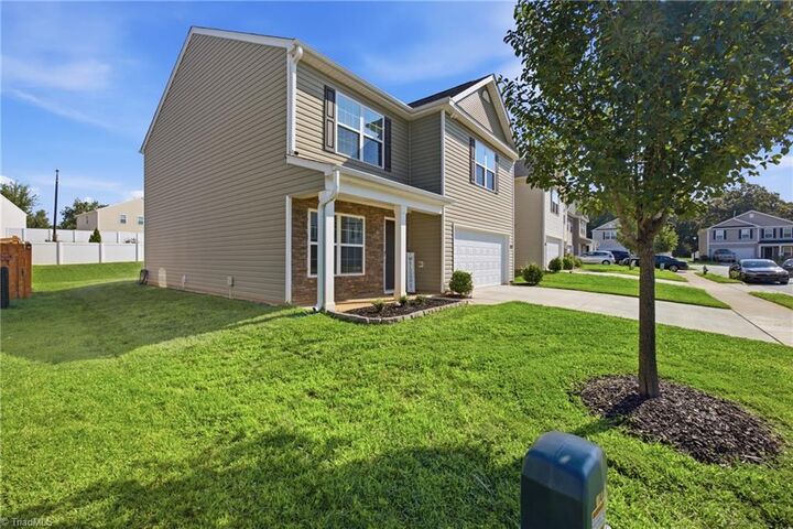 Property Photo:  5143 Nokota Place  NC 27405 