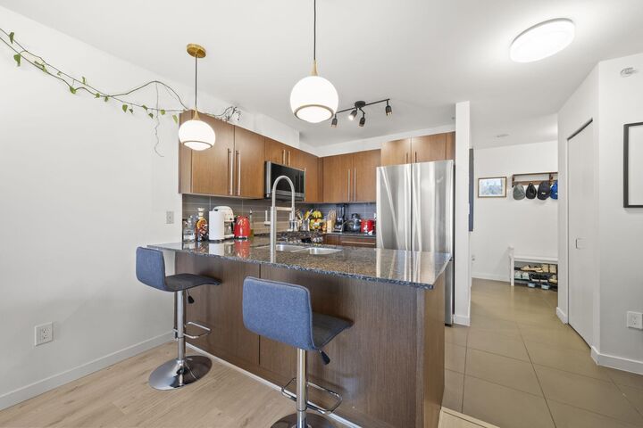 Property Photo:  4888 Brentwood Drive 208  BC V5C 0C6 