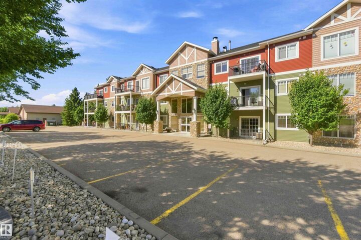 Property Photo:  4922 52 Street 111  AB T0A 1N0 