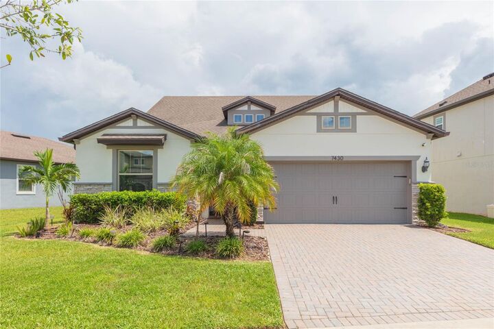 Property Photo: 7430 Pool Compass Loop FL 33545