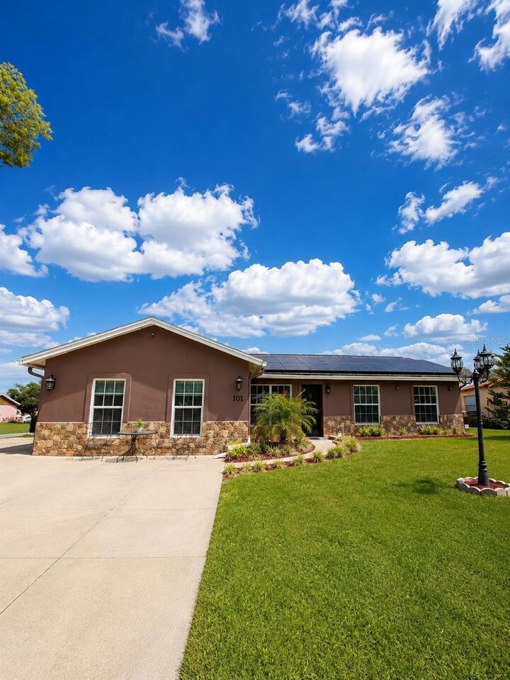 Property Photo: 101 Gardenia Rd FL 34743