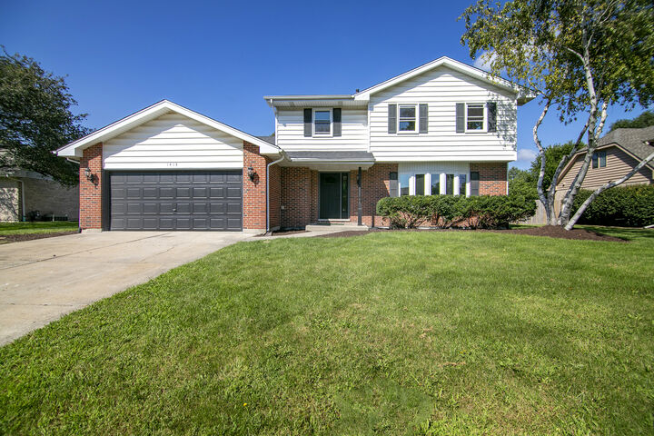 Property Photo: 1413 Delmar Drive IL 60451