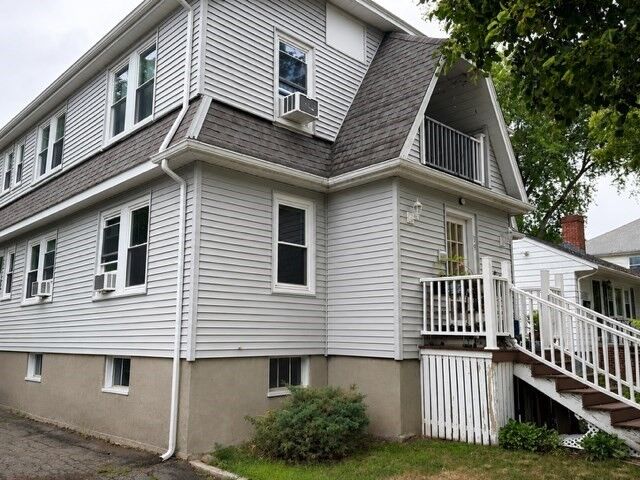 Property Photo: 39 Brook Rd 1L MA 02169