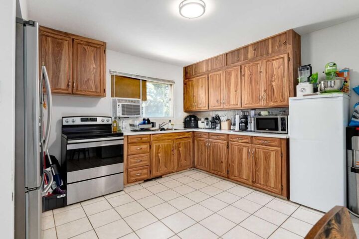 Property Photo: 113 Hounslow Drive NW AB T2K 2E6