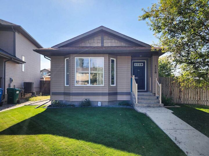 Property Photo:  118 Silkstone Road W  AB T1J 2G3 