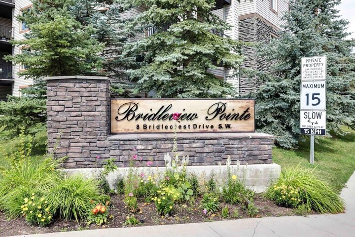 Property Photo: 8 Bridlecrest Drive SW 1323 AB T2Y 0H6