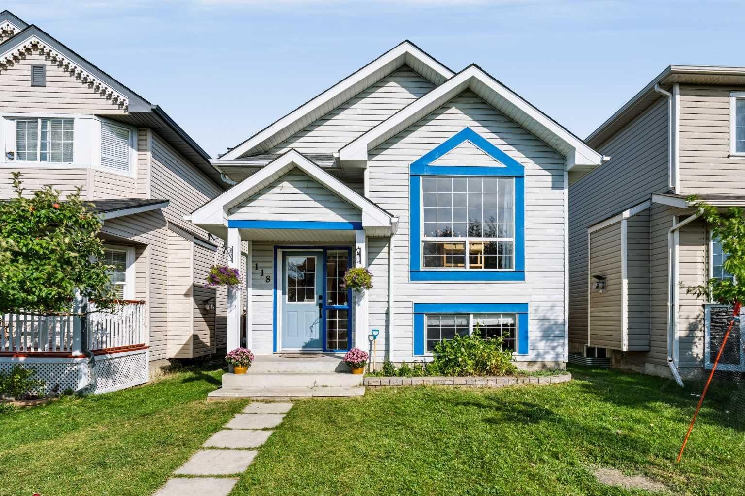Property Photo:  118 Cimarron Grove Crescent  AB T1S 2E2 