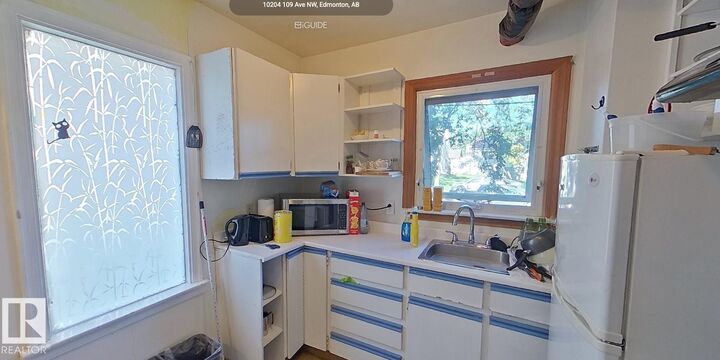 Property Photo:  10204 123 Avenue NW  AB T5G 0V6 