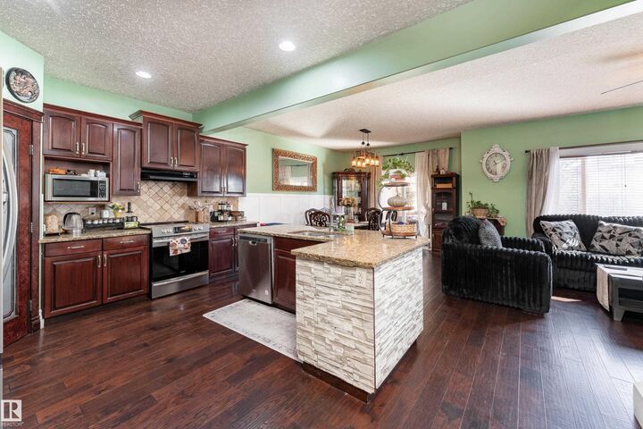 Property Photo:  16613 58A Street NW  AB T5Y 0J3 