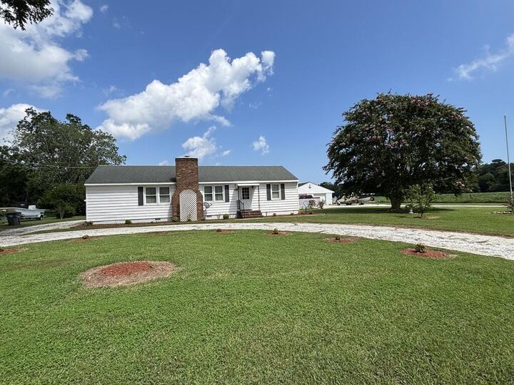 Property Photo: 24189 Joynes Neck Rd VA 23301