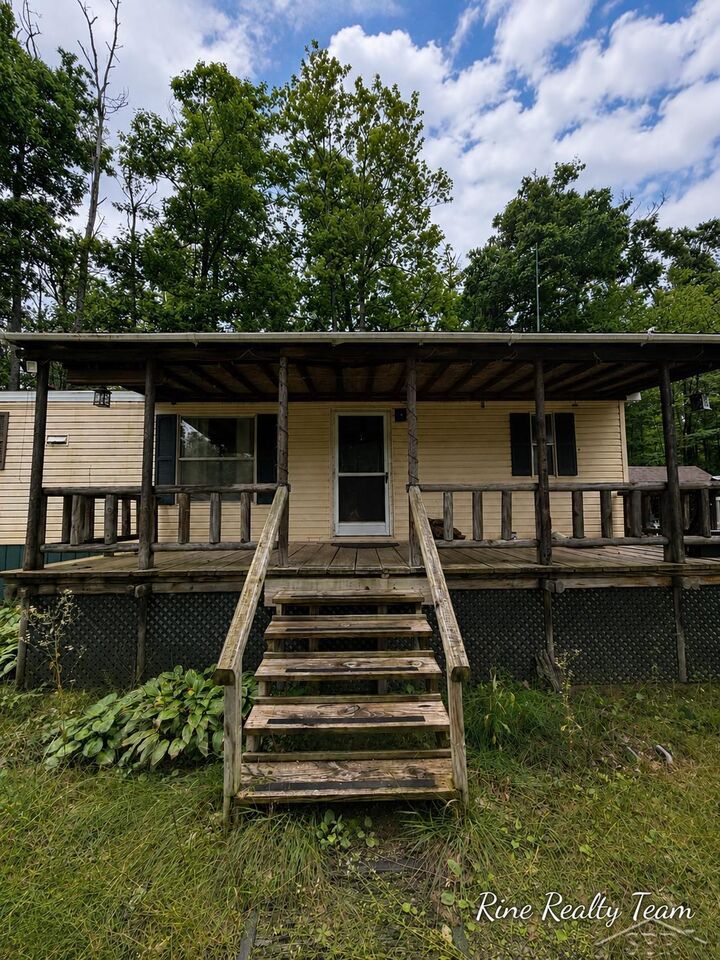 Property Photo:  1385 Allard Acres Trail  MI 49751 
