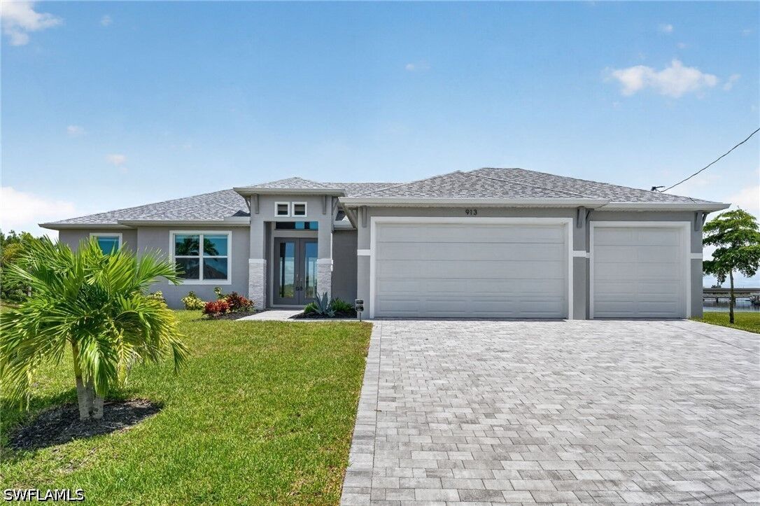 Property Photo: 913 NW 33rd Place FL 33993