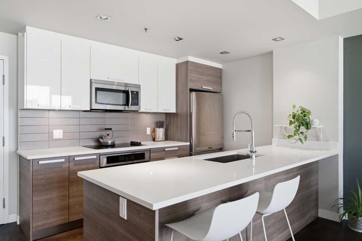 Property Photo:  235 9A Street NW 506  AB T2N 4H7 
