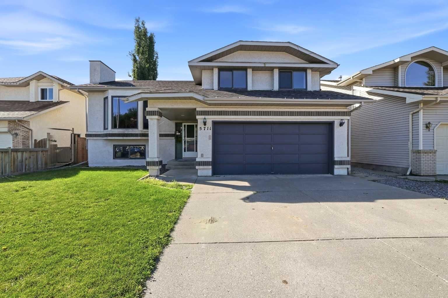 Property Photo:  5711 61 Avenue  AB T4T 1J2 