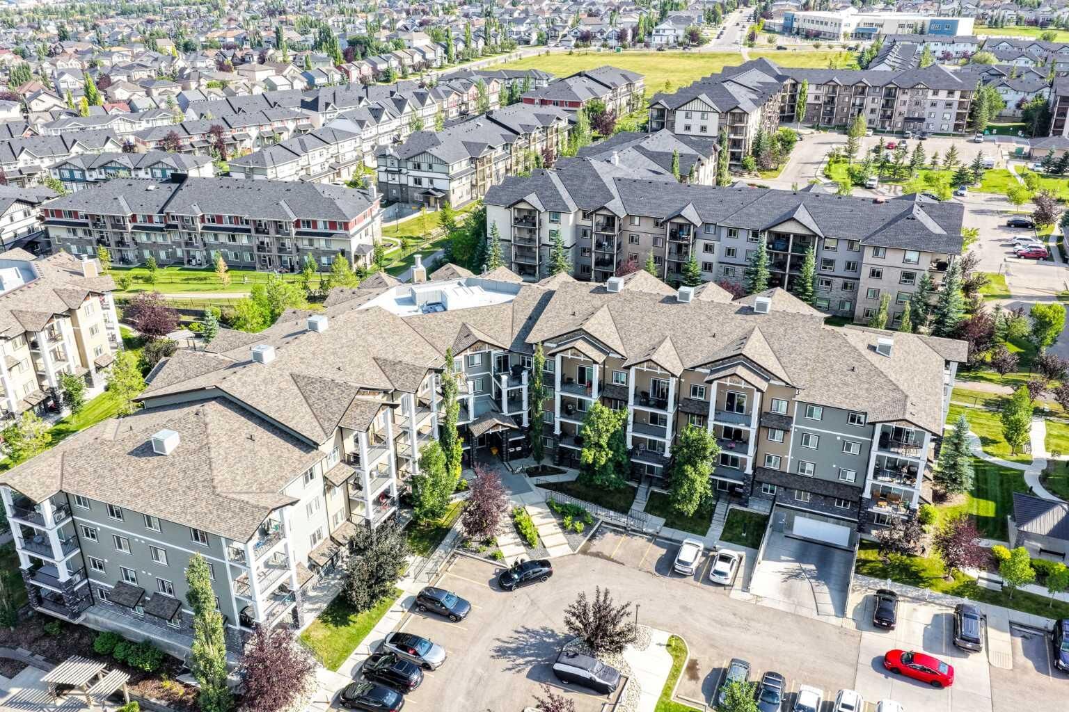 Property Photo:  130 Panatella Street NW 2414  AB T3K 0Y6 