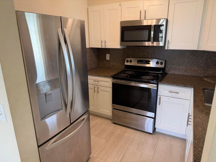 Property Photo: 1512 SE Royal Green Circle 203 FL 34952