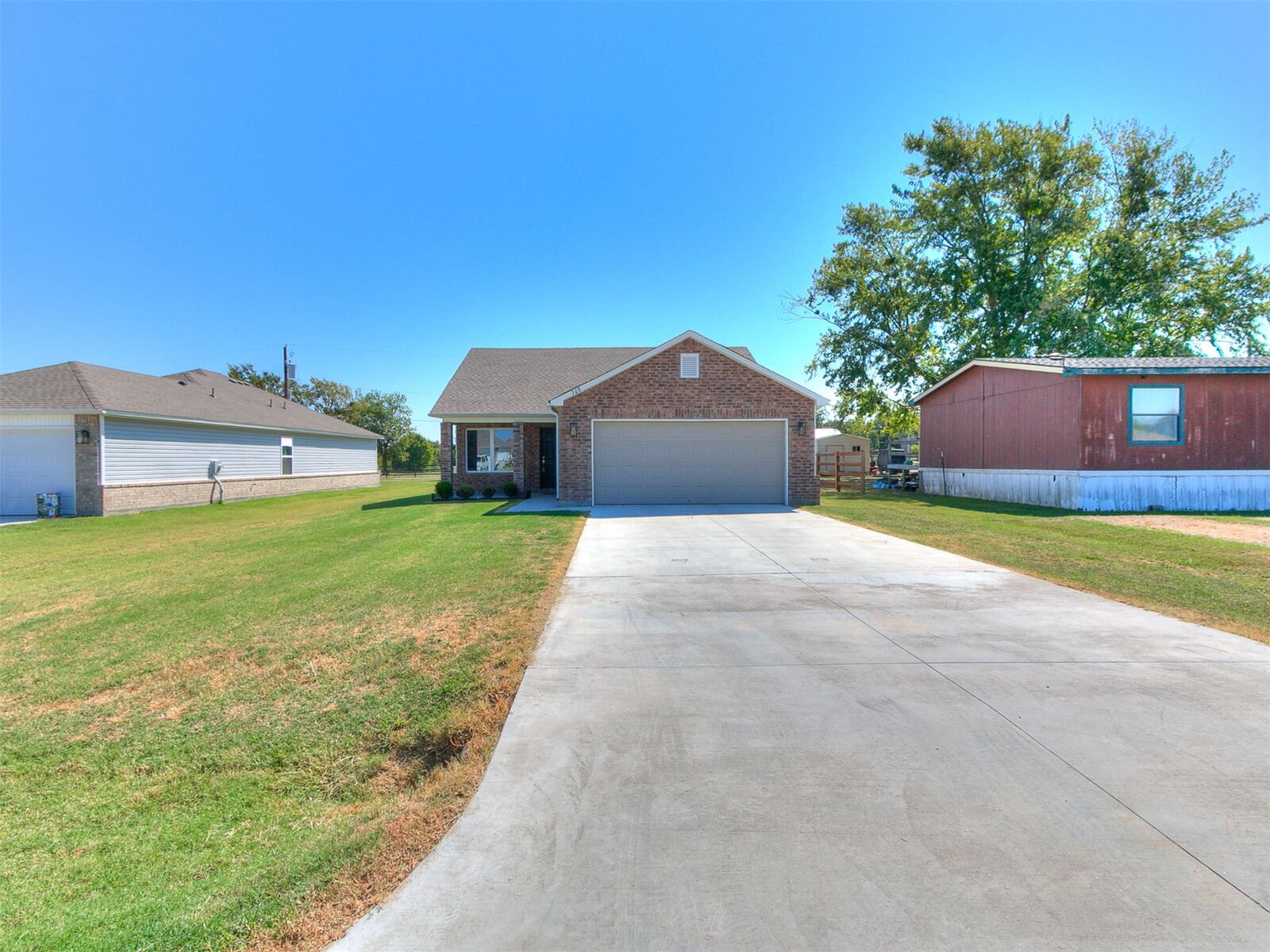 Property Photo:  708 N Redbud Avenue  OK 74421 