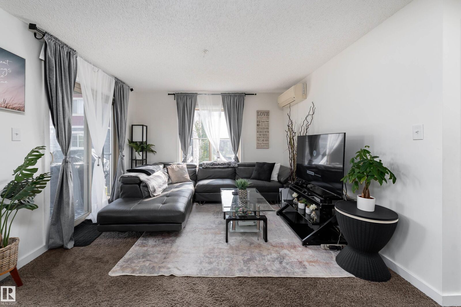 Property Photo:  1060 McConachie Boulevard NW 317  AB T5Y 0W9 