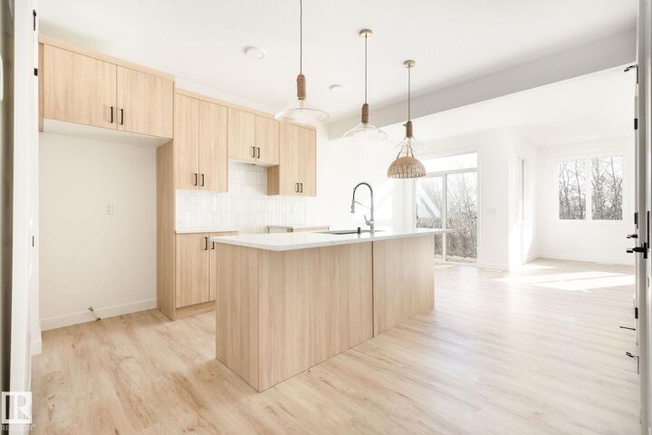 Property Photo:  2619 62 Street SW  AB T6X 3G3 