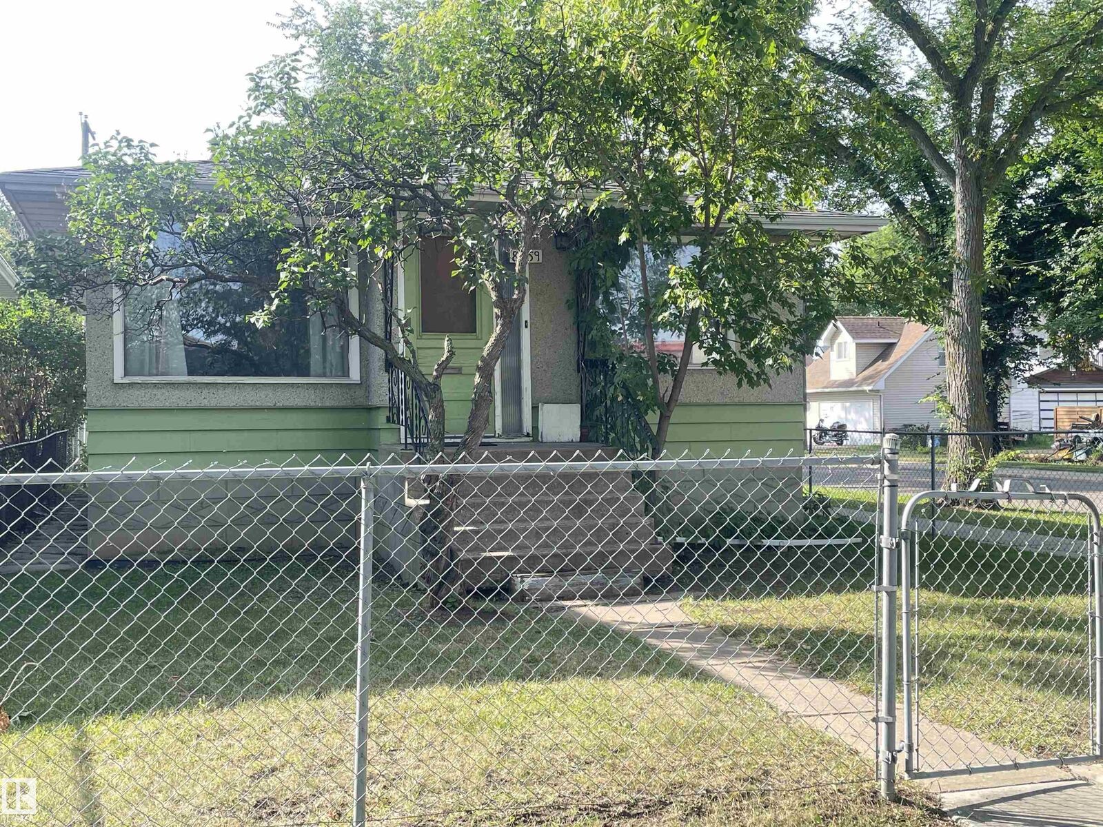 Property Photo:  8759 81 Avenue NW  AB T6C 0W5 